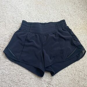 Lululemon black high-rise Hotty Hot shorts (size 0, 2.5 inseam)